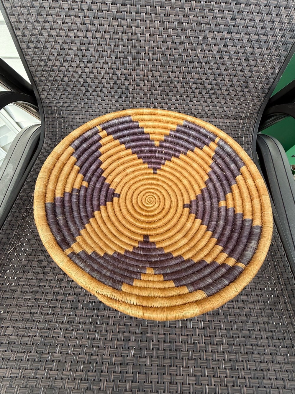 decorative hand-woven African basket bowl wall hanging. Tribal